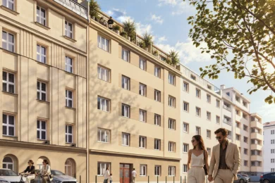 Vizualizace budoucí podoby činžovního domu Družstevní 5 v pražských Nuslích. Projekt společnosti PSN nabídne po rekonstrukci 32 jednotek, některé s terasami, a společný dvůr s posezením a grilem. Dokončení se plánuje na druhé čtvrtletí roku 2028.